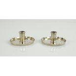 Pair of silver taper- stick holders, each plain with pie-crust rims, 5.5 cm diam. 59 gr. (2) .