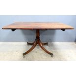 Rosewood tilt top dining table.