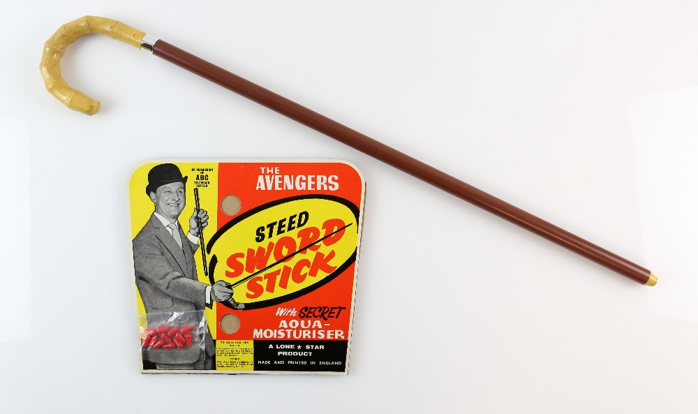 The Avengers - Steed Sword Stick made by Lone Star, 25 inches.. Stick - Generally good. Adhesive