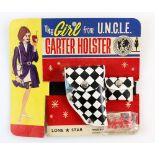 The Girl From U.N.C.L.E. - Garter Holster made by Lone Star in 1966, with original card..