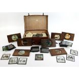 Collection of glass Victorian and later magic lantern slides to include a mechanical waterwheel