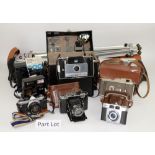 UPDATED DESCRIPTION - One Olympus OM10 SLR 35mm camera, Olympus OM2 camera, with various lenses,