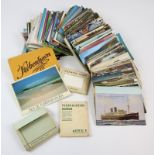 Collection of postcards boxed and album