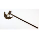 CHANGE TO DESCRIPTION: SWORD STICK WITHDRAWN FROM THIS LOT An iron axe with engraved 21cm blade