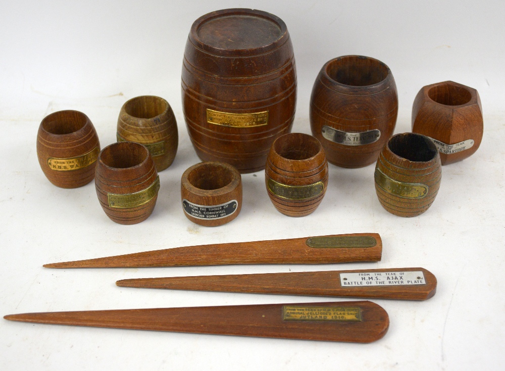 Collection of teak ship treen all with plaques Eight Match holders the wood taken from HMS Iron Duke