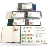 Blue Swiftsure album, green stockbook containg Great Britain Decimal mint stamps and three albums of