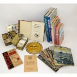 Cigarette cards, military books, WWII epherema including War Gasses identification disk,. Air Raid