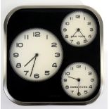 A Karlsson quartz wall clock with subsidiary dials for New York and Hong Kong time, a chrome cased