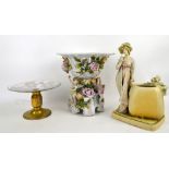 Amphora figural vase, continental figural centrepiece with moulded flowers and putti, and a