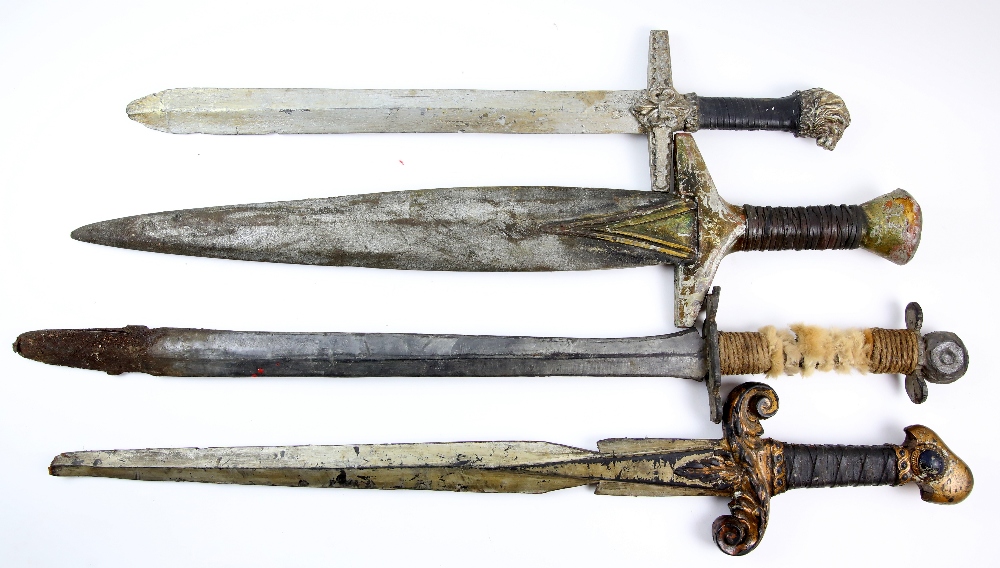 Hercules / Xena - Four production used battle swords, longest 90cm. .