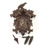 Black forest style cuckoo clock with two weights