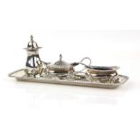 Modern silver cruet set, comprising salt, mustard, pepperette and tray, with gadrooned borders, with