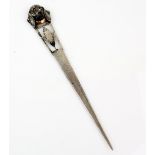 Early 20th century sterling silver page-turner, with dog-head finial, 31 cm long, 98 gr. .