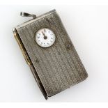 Early 20th century Swiss silver combination compact/travel-clock/photograph-frame, including a