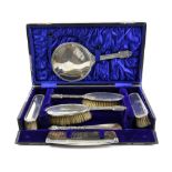 George V silver-mounted dressing table set, in fitted case, by J & R Griffin, Chester 1913,