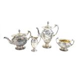 Victorian silver Art Nouveau tea service, comprising teapot, hot water jug, sugar bowl and cream