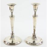 Pair of George III silver candlesticks of tapering form on round bases, by Matthew Boulton,