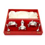 Modern silver three piece cruet set, comprising salt, mustard pot and cover and pepperette with
