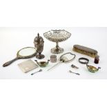 Group of silver items to include a pierced silver pedestal stand, cigarette case, pair of