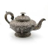 William IV silver teapot with embossed floral decoration, by J Wrangham & William Moulson, London,