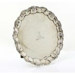 Edward VII silver salver with shell and 'C'-scroll moulded border on three scroll feet, by