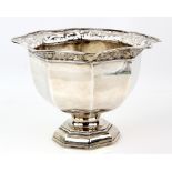 George V silver bowl of octagonal section, the rim with pierced scrolling decoration, by Harrods