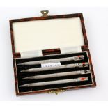 Set of four sterling silver and enamel bridge pencils, with engine turned decoration, in fitted