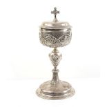 Edward VII silver ciborium, with embossed decoration, gilt interior on round foot, by Frederick