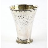 19th century Swedish parcel-gilt silver beaker, the tapering body chased, with gilt borders, on