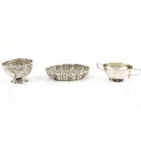 Victorian silver sugar bowl with embossed floral decoration, on round foot, by Fenton Brothers Ltd.,