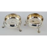 George III pair of silver salts, each on three hoof feet, with beaded borders, 7 cm diam., maker's