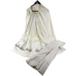 Victorian full length white cotton skirt the lower panel embroidered with leaf motif and a cream