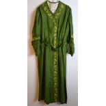 Aesthetic dress of forest green silk with a broad band of hand embroidery C 1900, rouched sleeves