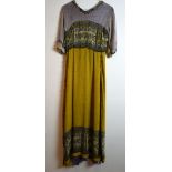 Edwardian dress of ochre Indian silk with lacis lace, top and patterned border, lilac silk lining