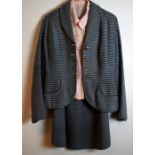 1940's wool suit of two tone grey stripe, labelled Brenna sport, with a pink silk blouse, shorts