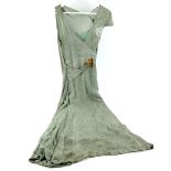 1930s celadon green evening dress with silver thread embellishment and Lucite buckle Provenance :