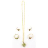 Peridot flower head pendant, set with six marquise cut peridot on pierced panel, twist link chain,