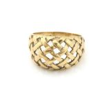 Gold ring with lattice frame, in 9 ct yellow gold, ring size P. CONDITION9 ct weight 4.8 grams