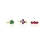 Three gem set rings, one emerald cluster, ring size N, another set with five synthetic rubies,