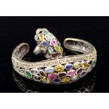 Silver and multi gem set bangle and ring . All stones are present bracelet, split on edge of side