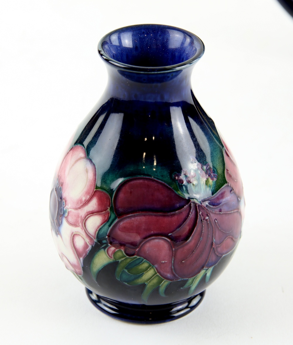 Moorcroft pottery baluster vase, the blue ground with floral decoration, on round foot, paper - Image 2 of 4