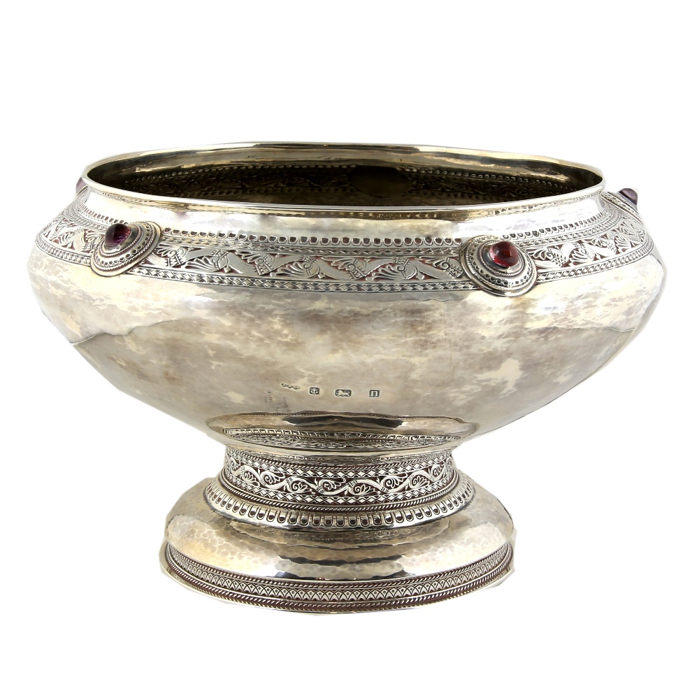 Liberty & Co a large silver bowl with chased frieze, the design of stylised branches and leaves