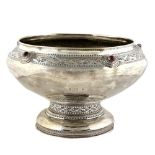 Liberty & Co a large silver bowl with chased frieze, the design of stylised branches and leaves
