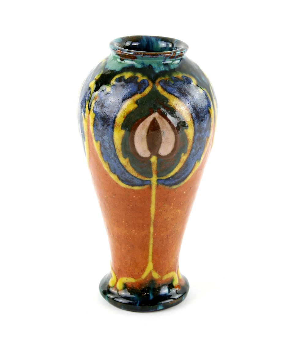 Royal Doulton early 20th century Art Nouveau style vase with floral motifs in brown and yellow on an