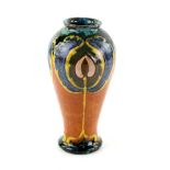 Royal Doulton early 20th century Art Nouveau style vase with floral motifs in brown and yellow on an