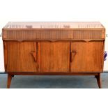 Waring & Gillow dining suite comprising a sideboard with three reeded drawers over three