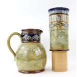 Doulton stoneware jug and water filter with mask and tubelined decoration, filter height 26 cm .