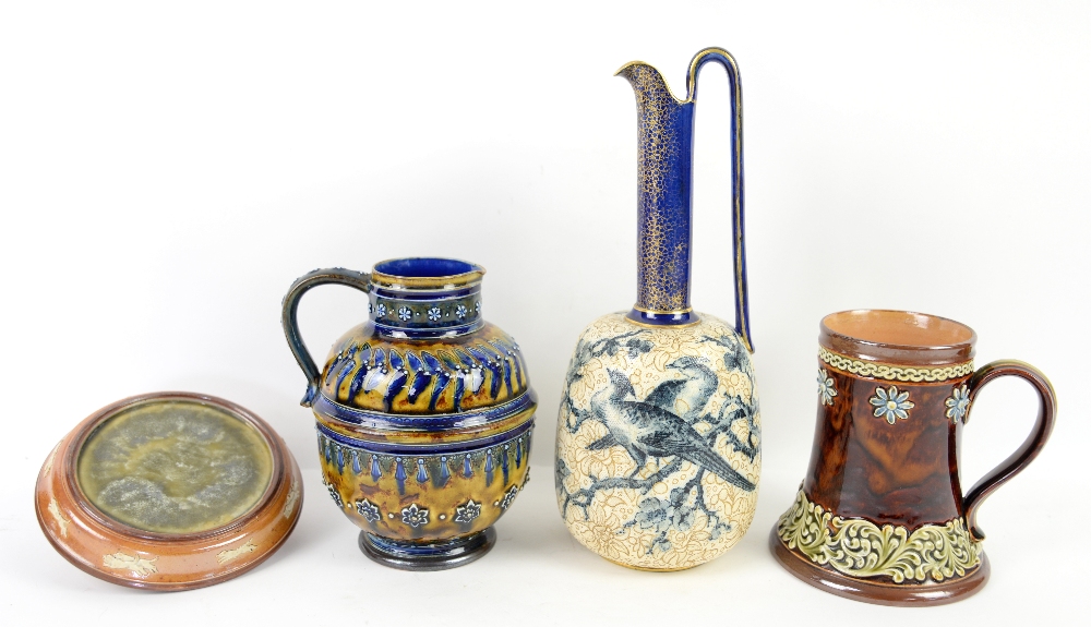 A group of Doulton lambeth stoneware, a bulbous jug with applied decoration, impressed mark H.W,