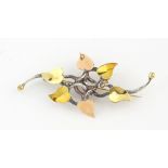 Brett Payne brooch, leaves in 18 ct yellow and rose gold and entwined stems and berries in silver,