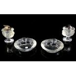 Two Lalique glass Tete de Lion, glass dishes/ashtrays, 14.5 cm, one signed, and with two similar